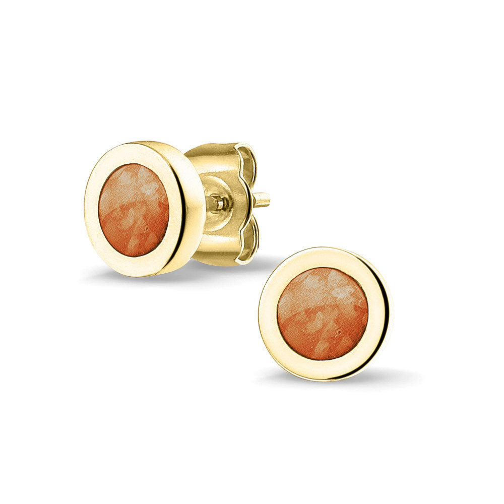 Rond gevormde oorstekers 8 mm aan de voorzijde zichtbaar gevuld met as of haar. Orange