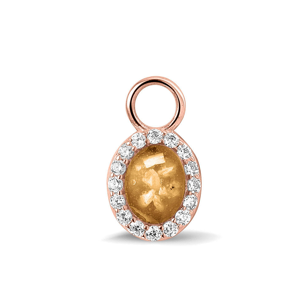 Ovaal gevormde oorhangers, 18 mm lang rondom afgewerkt met zirkonia's, aan de voorzijde zichtbaar gevuld met as of haar. gold.