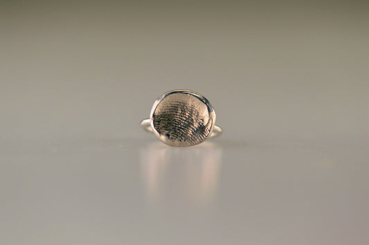 Ring met vingerafdruk