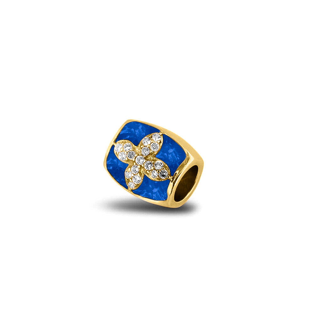 Asbedel met  zirkonia's, aan beide zijdes in twee compartimenten zichtbaar gevuld met as of haar. Blue