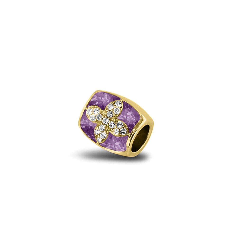Asbedel met  zirkonia's, aan beide zijdes in twee compartimenten zichtbaar gevuld met as of haar. Purple