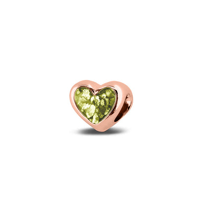 Hartvormige asbedel, aan beide zijdes zichtbaar gevuld met as of haar. Het vullen en sealen met onze speciale hars met een keuze in 20 kleuren, wordt in onze ambachtelijke edelsmederij gedaan. Olive