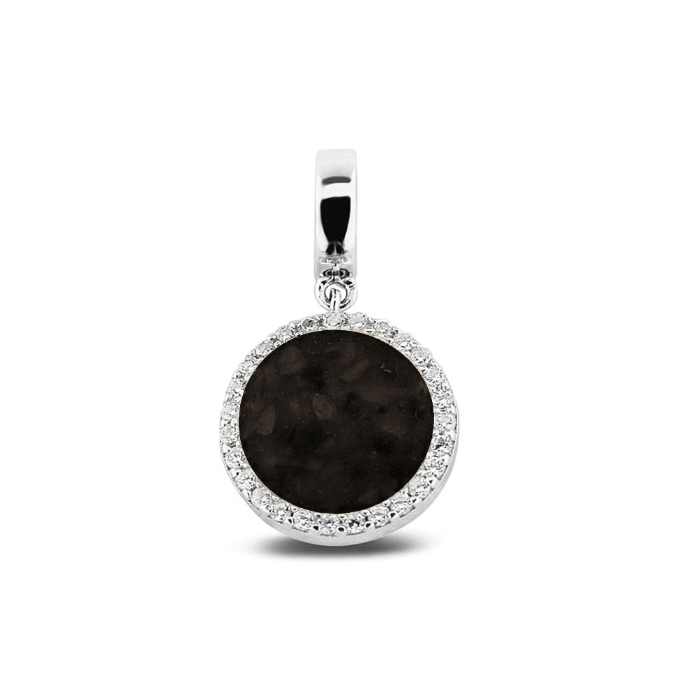 Asbedel, subtiel design rondom afgewerkt met zirkonia's  die aan de voorzijde zichtbaar gevuld wordt met as of haar met een keuze in 20 kleuren. Black