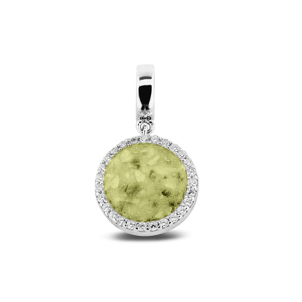 Asbedel, subtiel design rondom afgewerkt met zirkonia's  die aan de voorzijde zichtbaar gevuld wordt met as of haar met een keuze in 20 kleuren. Olive