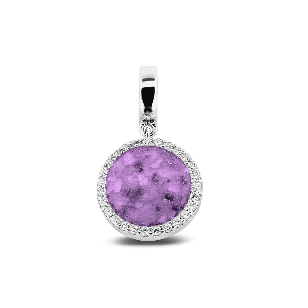 Asbedel, subtiel design rondom afgewerkt met zirkonia's  die aan de voorzijde zichtbaar gevuld wordt met as of haar met een keuze in 20 kleuren. Purple