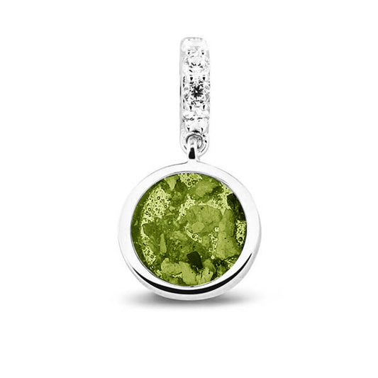 Asbedel rond subtiel design , het hangoog aan de buitenrand afgewerkt met zirkonia's, die aan de voorzijde zichtbaar gevuld wordt met as of haar met een keuze in 20 kleuren. Green