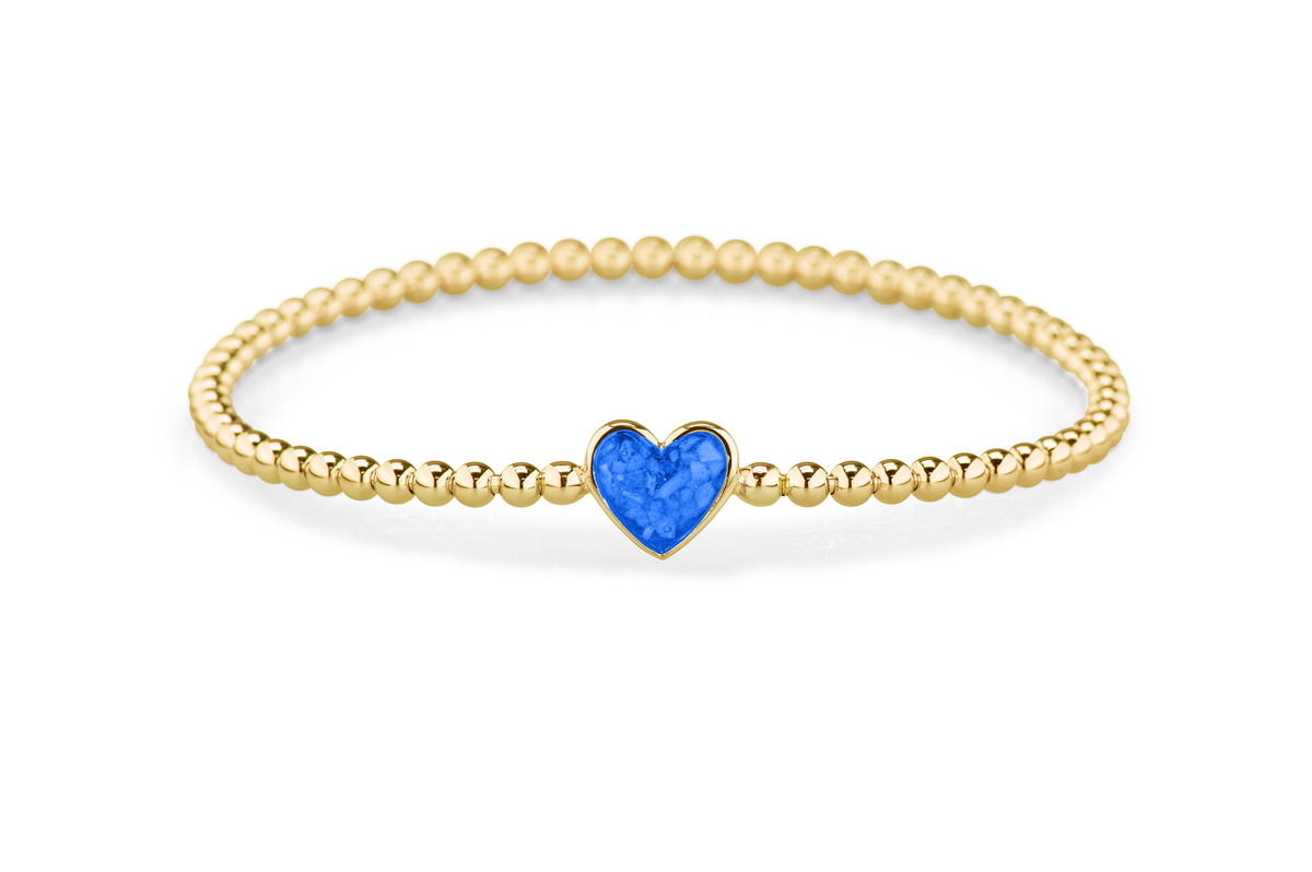 Flexibele as armband met hart als compartiment voor as of haar, gedenksieraden. Blue