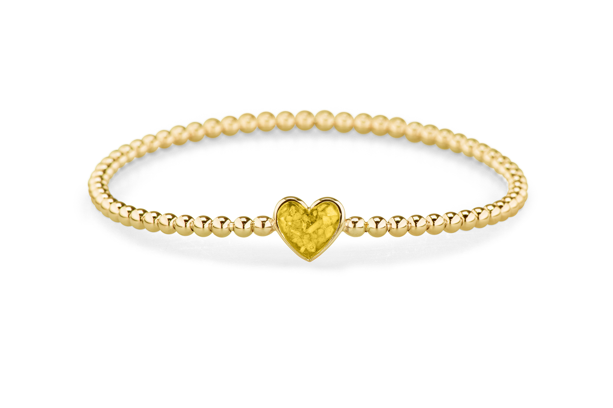 Flexibele as armband met hart als compartiment voor as of haar, gedenksieraden. Yellow
