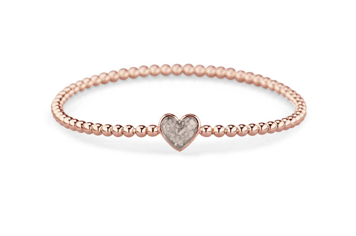 Flexibele as armband met hart als compartiment voor as of haar, gedenksieraden. Silver