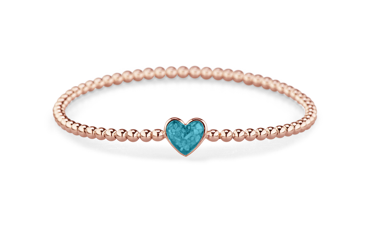 Flexibele as armband met hart als compartiment voor as of haar, gedenksieraden. turquoise