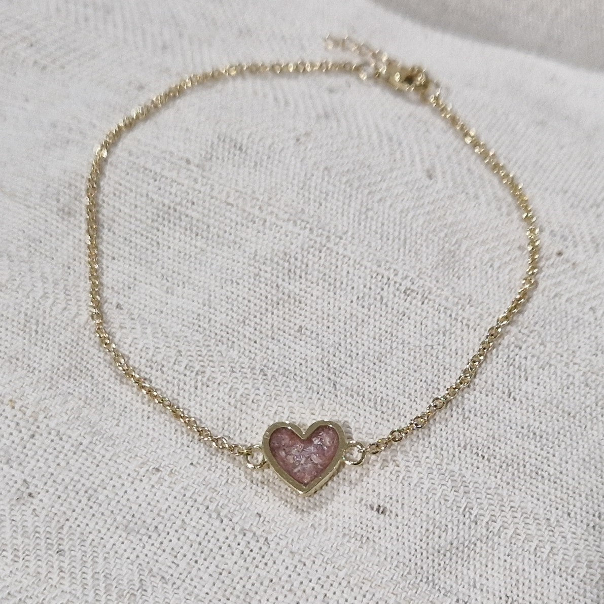 as armband met hartje als gedenksieraad. Alle