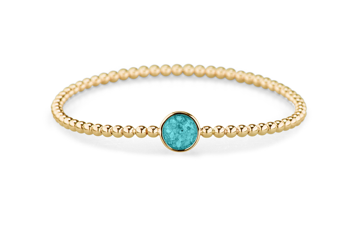 Flexibele as armband met rondje als compartiment voor as of haar, gedenksieraden. Aqua