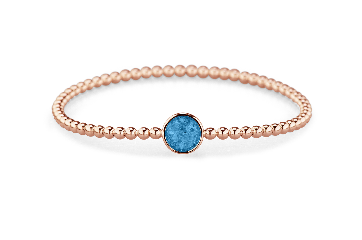 Flexibele as armband met rondje als compartiment voor as of haar, gedenksieraden. Marine