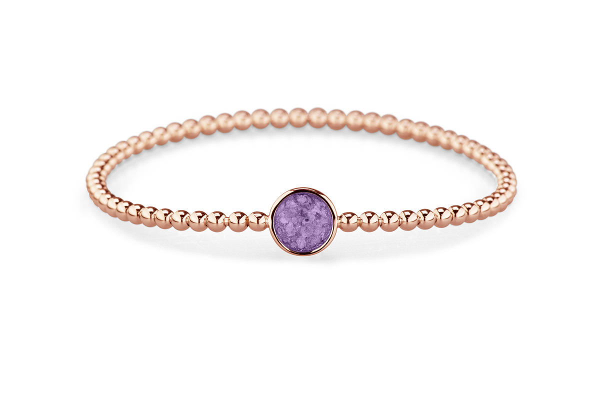 Flexibele as armband met rondje als compartiment voor as of haar, gedenksieraden. Purple