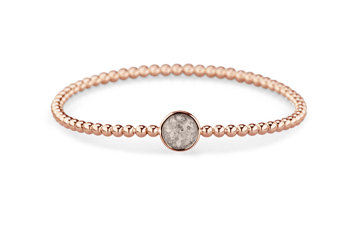 Flexibele as armband met rondje als compartiment voor as of haar, gedenksieraden. Silver