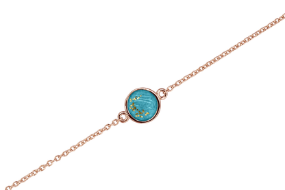 As armband met rondje als compartiment in het midden aan de voorzijde. Turquoise