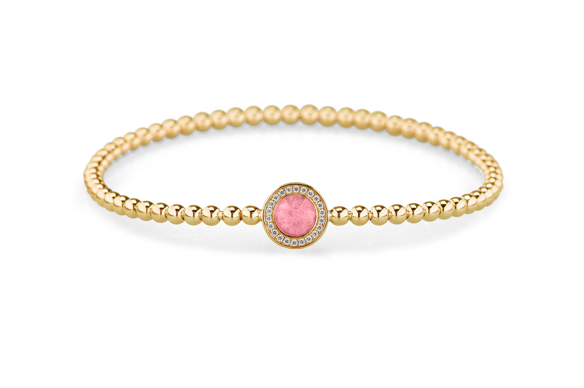 Flexibele as armband met rondje als compartiment gezet rondom met zirconia's voor as of haar. Soft
