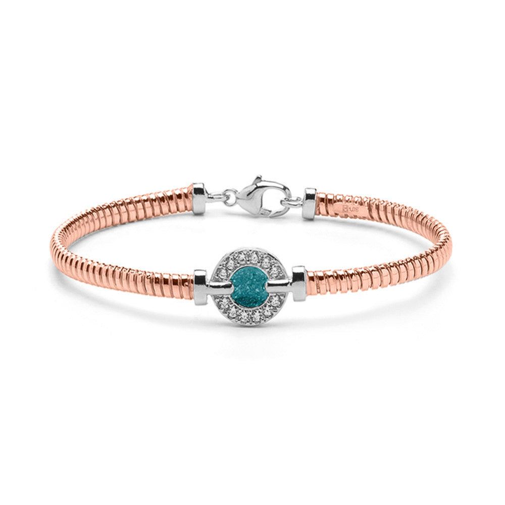 Zilveren vergulde as armband afgewerkt rondom met zirkonia's. aqua