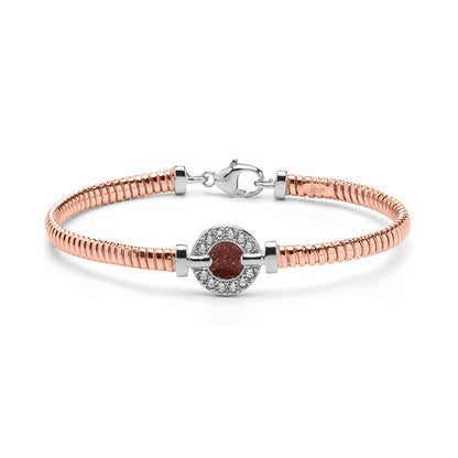 Zilveren vergulde as armband afgewerkt rondom met zirkonia's. brown