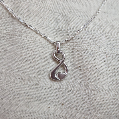 Ashanger infinity met hartje,de ashangers uit deze collectie gedenksieraden zijn eenvoudig zelf te vullen en te bestellen in zilver, geelgoud en witgoud