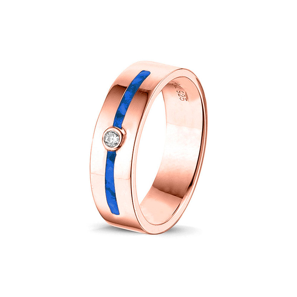 Asring 5 mm uit onze serie gedenksieraden, waar zichtbaar as of haar verwerkt wordt in twee separate compartimenten met in het midden een zirkonia of diamant naar keuze. Blue