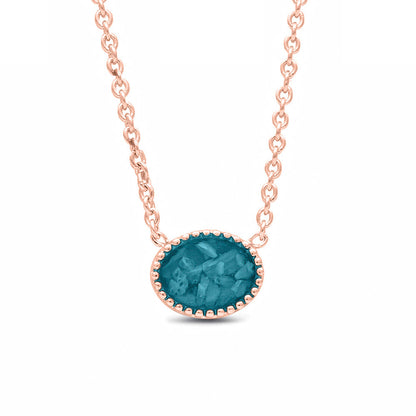 Ashanger, gedenksieraad, waar as en haar in verwerkt wordt. turquoise