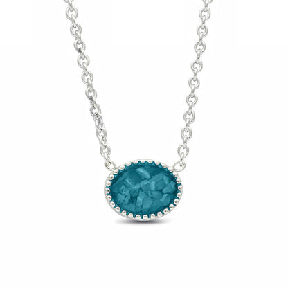 Ashanger, gedenksieraad, waar as en haar in verwerkt wordt. turquoise