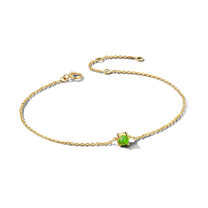 Exclusieve 14 KT geelgouden anker armband met geboortesteen in chatonzetting.